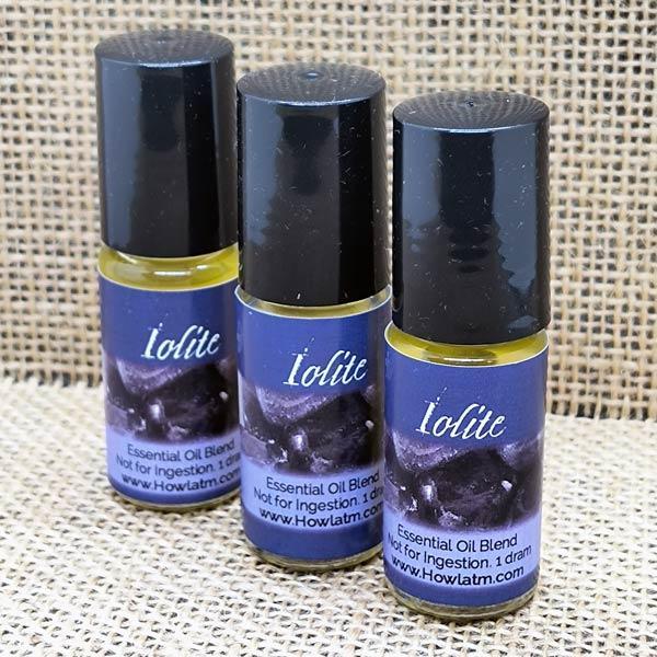 Iolite gem infused custom blended oil in roll on bottle